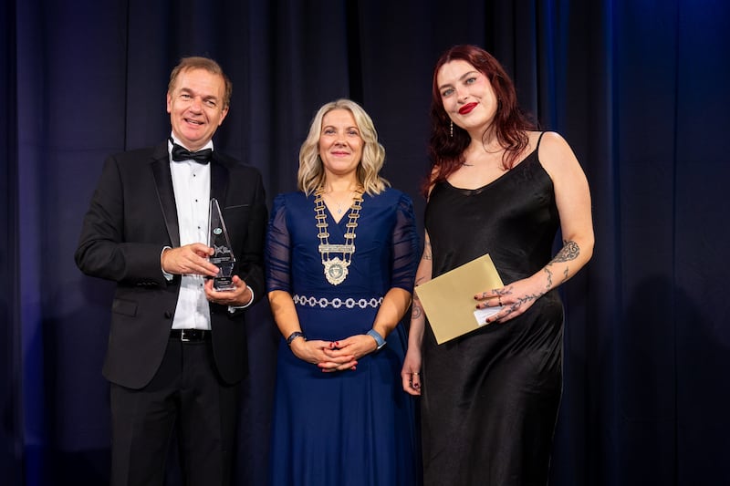 Irish Exporters Association chief executive Simon McKeever, president Gabrielle White, and a representative of Rhenus Logistics Ireland Ltd, winner of logistics and supply chain company of the year category, sponsored by Descartes Thyme. Photograph: Karl Hussey Photography