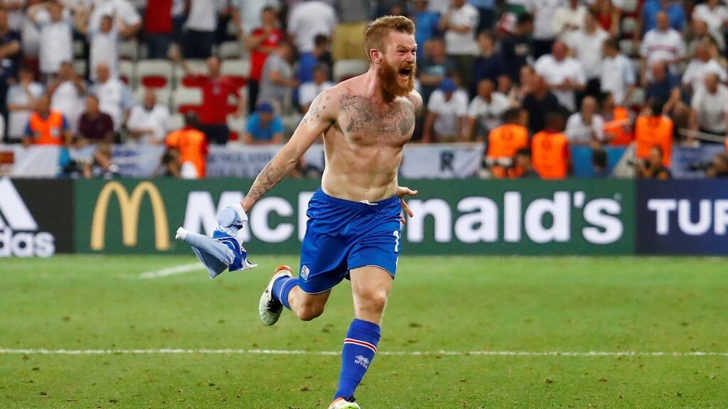 Aron Gunnarsson celebrates after Iceland knock England out of the tournament. Photograph: Michael Dalder/Reuters