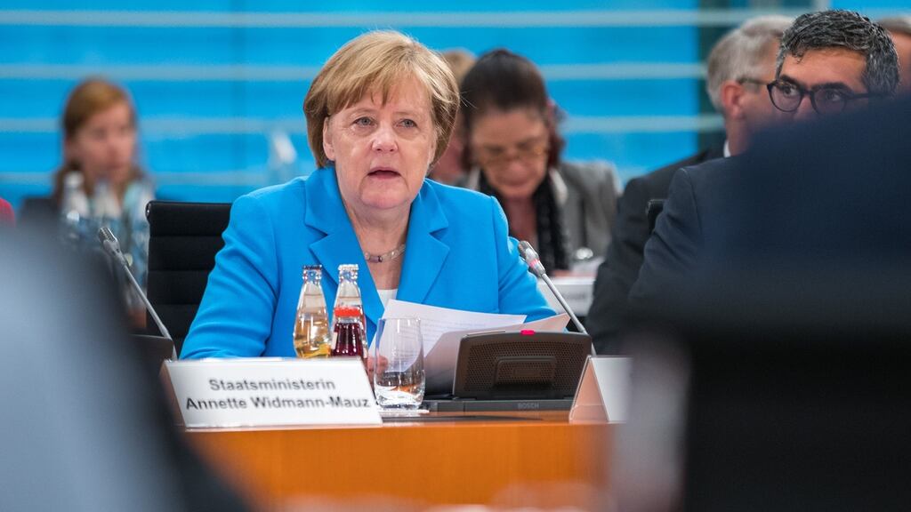 Chancellor Angela Merkel attends the German government’s integration summit in Berlin on Wednesday. Photograph: Jens Buttner/AFP/Getty Images