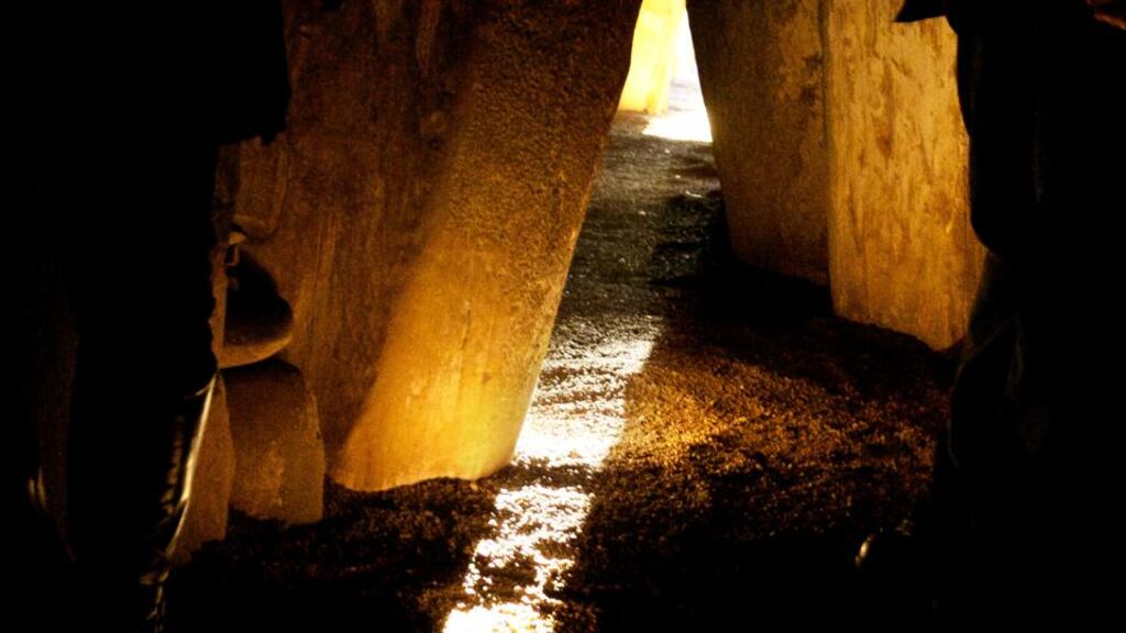 The sun shines along the passage floor into the inner chamber at Newgrange during the winter solstice. Photograph: Alan Betson/The Irish Times