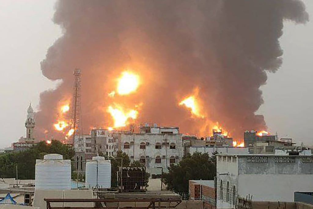 A handout picture obtained from Yemen's Houthi Ansarullah Media Centre show a huge column of fire erupting following strikes claimed by Israel in the Yemeni rebel-held port city of Hodeidah om Saturday. Photograph: Ansarullah Media Centre/AFP via Getty Images)
