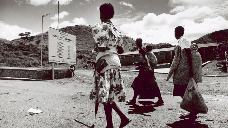 Tutsi refugees crossing the border back into south eastern Rwanda from Tanzania after the RPF (Rwandan Patriotic Front) had taken control of the area. Photograph: Frank Miller