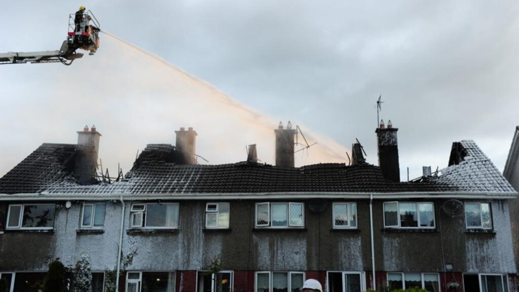 Fire engines from Navan, Trim and Kells attend the scene of a fire that damaged four houses in the Claremont Estate, Navan. Photograph:Barry Cronin