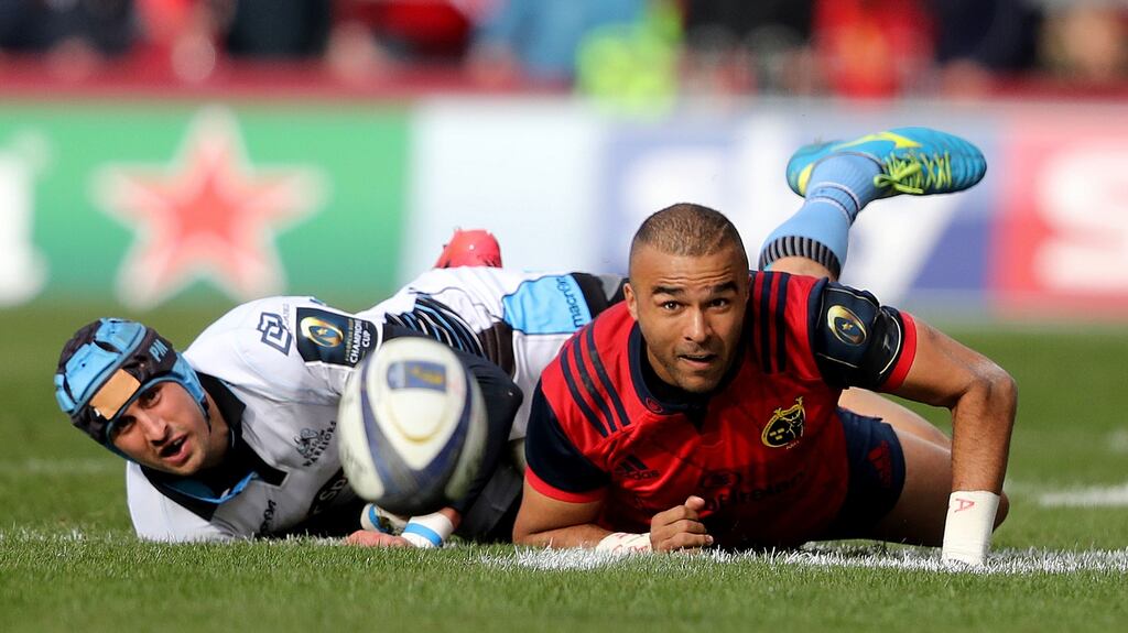 Munster’s Simon Zebo with Peter Murchie of Glasgow Warriors: sides meet in crunch match in Scotstoun on Saturday. Photograph: Dan Sheridan/Inpho