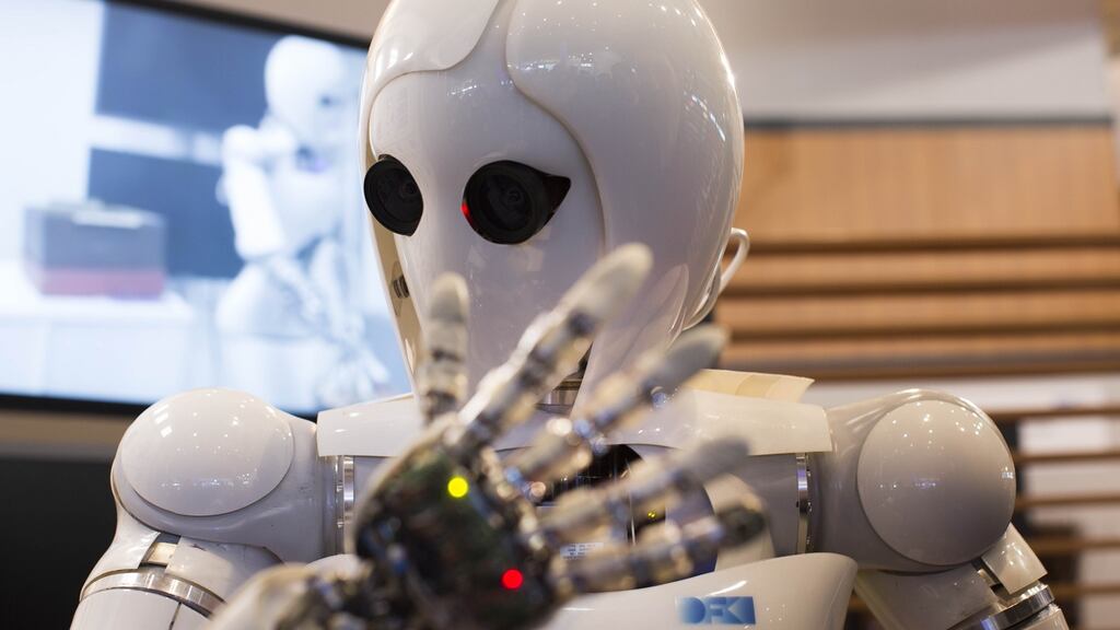 An artificial intelligence android developed in Germany. PwC’s forum “Man and Machine” on the economic impact of AI in Ireland takes place at Convention Centre Dublin on Wednesday. Photograph: Carsten Koall/AFP/Getty Images
