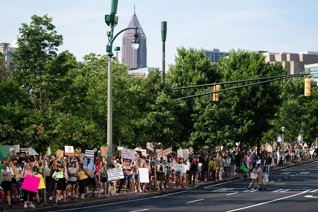 People in Atlanta, Georgia, demonstrate against the supreme court's ruling to overturn the Roe v Wade case, removing a federal right to an abortion. Photograph: Elijah Nouvelage/Getty Images