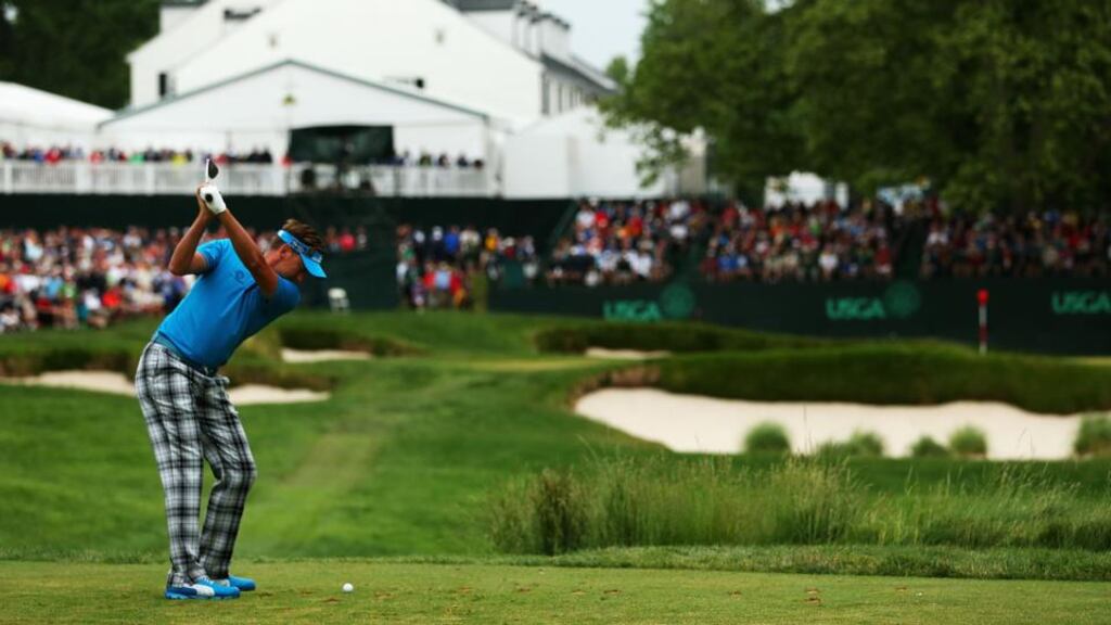 Ian Poulter of England hits his tee shot on the 13th hole during the first round of the 113th US Open at Merion Golf Club in Ardmore, Pennsylvania. Photograph: Andrew Redington/Getty Images