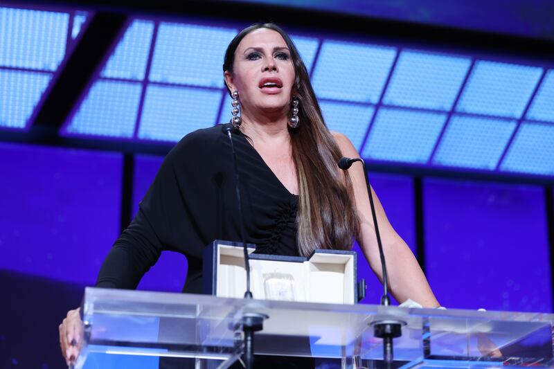 Karla Sofía Gascón accepts the best actress award for Emilia Perez, alongside Adriana Paz, Selena Gomez and Zoe Saldana, at the festival on Saturday. Photograph: Pascal Le Segretain/Getty Images