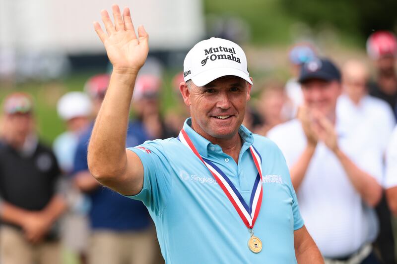 Pádraig Harrington waves to the crowd following his victory in Colorado. Photograph: Andrew Wevers/Getty Images