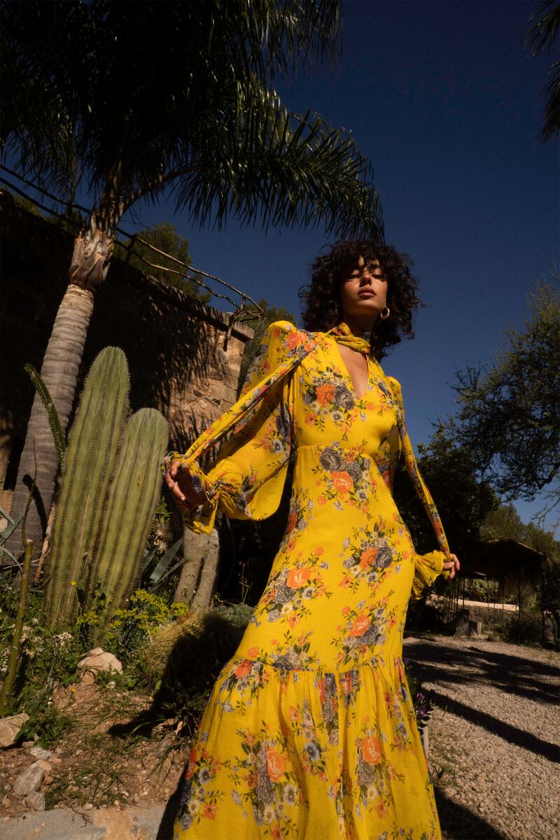 Yellow floral dress, €393, Queens of Archive