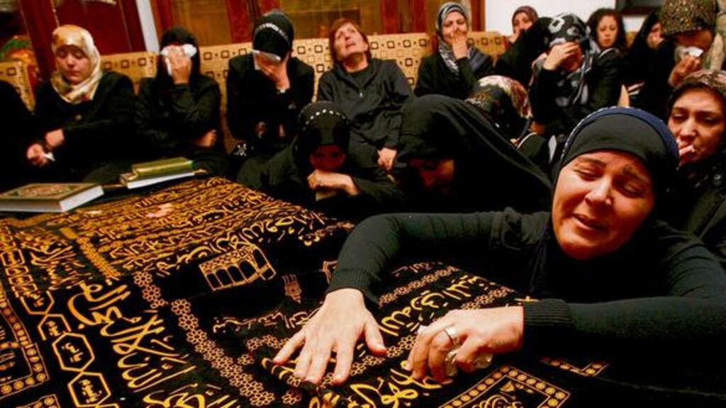 Relatives of Hassan Tajeddin, a victim of the Ethiopian Airlines crash, mourn at his funeral at Hanawei village in southern Lebanon