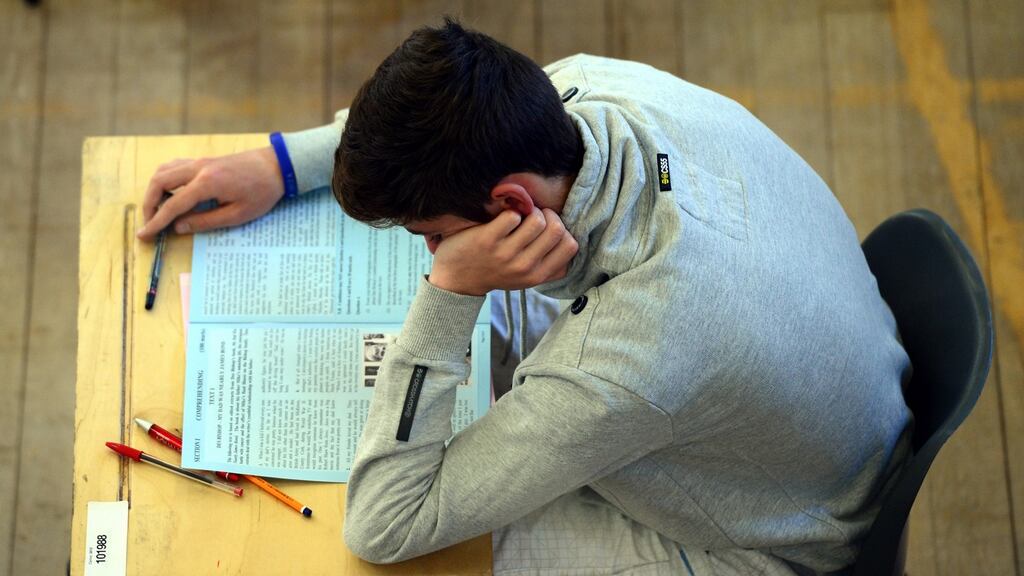 A student at Marian College Sandymount commences the English exam earlier this month. Photograph: Bryan O’Brien/The Irish Times