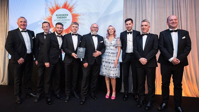 Adam Kane, senior sales executive at BusinessRiver, presents the best energy management team award to Thermo Fisher Scientific Cork team