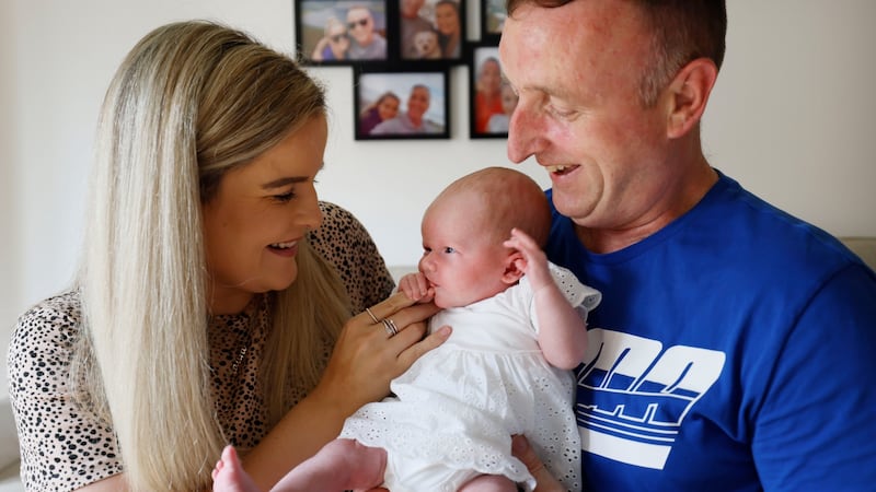 Laura Curtis from Baldoyle in Dublin with her partner Robbie Dalton and their baby Demi, who was born four weeks ago. Photograph: Alan Betson