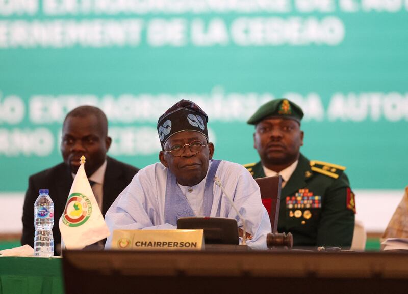 Nigeria's president Bola Ahmed Tinubu addresses Ecowas heads of state in Abuja at the weekend. Photograph: Kola Sulaimon/AFP via Getty Images