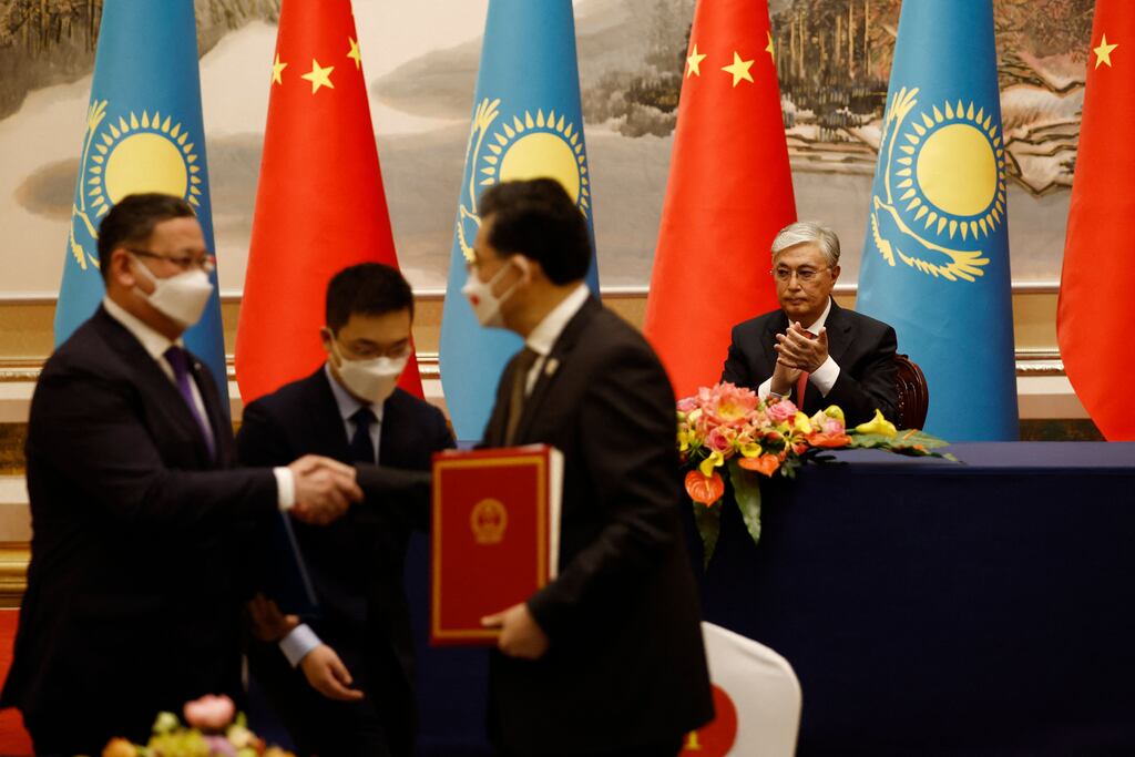 Kazakhstan's president Kassym-Jomart Tokayev (right) attends a signing ceremony with Chinese president Xi Jinping (not pictured), ahead of the China-Central Asia summit. Photograph: Getty Images