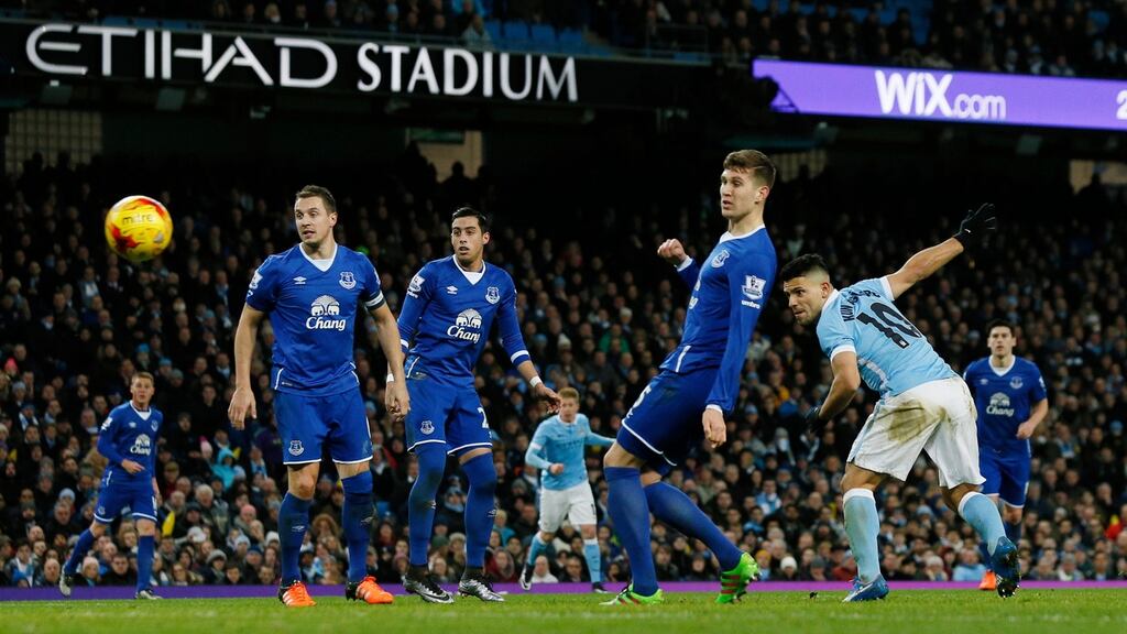 Sergio Agüero heads home Manchester City’s third goal in the Capital One Cup semi-final second leg against Everton at Etihad Stadium. Photograph: Jason Cairnduff/Action Images via Reuters/Livepic