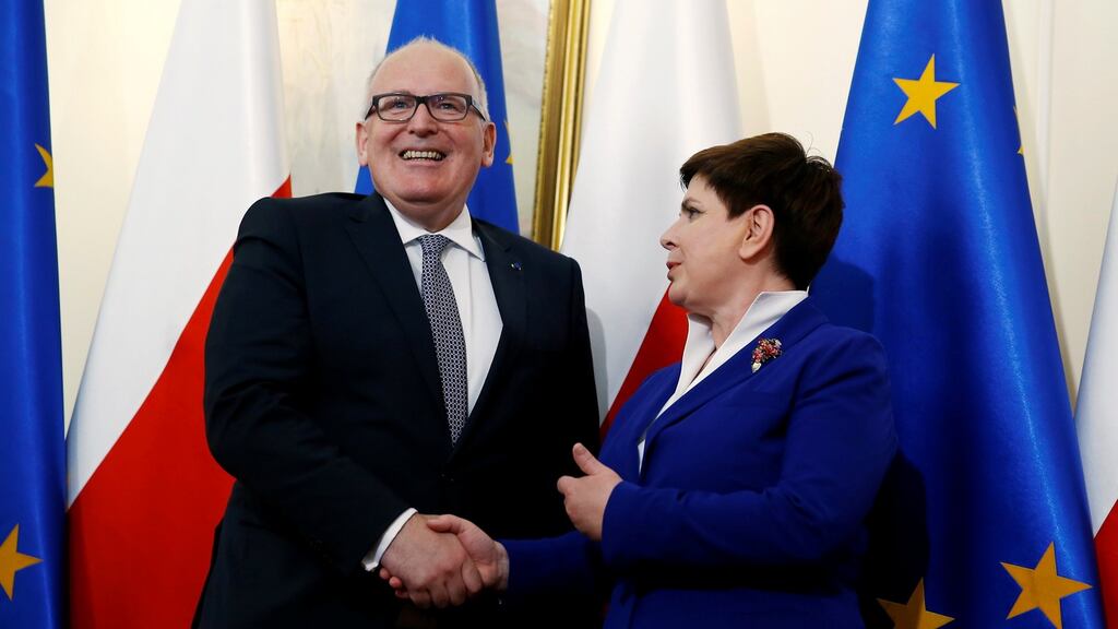 Frans Timmermans, deputy head of the European Commission, with Poland’s prime minister Beata Szydlo in Warsaw last week. Photograph: Kacper Pempel/Reuters