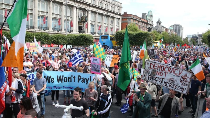Protesters on O’Connell Street, Dublin, during a demonstration against water charges. Photograph: Brian Lawless/PA