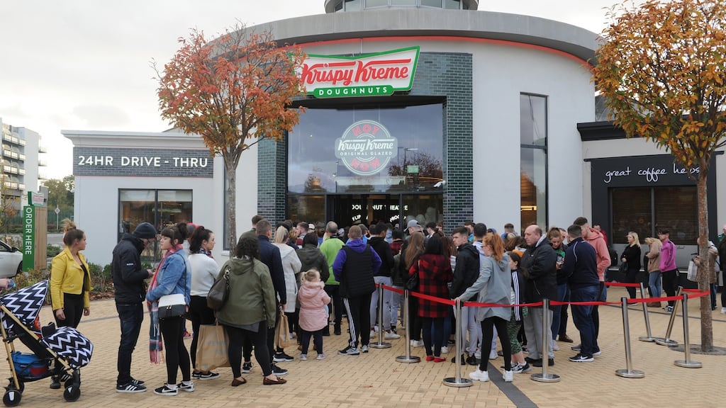 People queue outside the newly opened Krispy Kreme outlet at Blanchardstown Shopping Centre. Photograph: Aidan Crawley