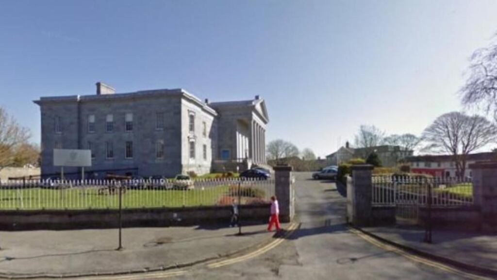 Keith Garrihy (18) and Jason Freyne (22) both walked out the back door of the Ennis courthouse and made a run for freedom.