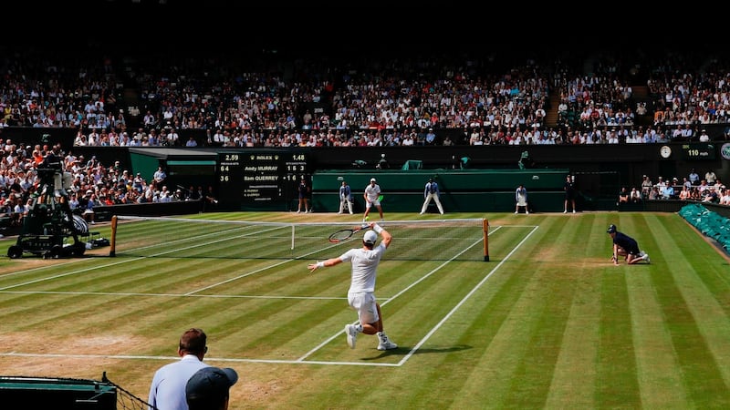 Murray returns during the Centre Court encounter. Photo: Adrian Dennis/Getty Images