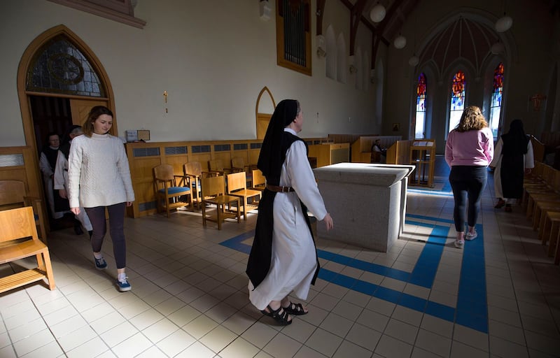 Call to prayer: Emma Brady, Sr Sarah and Grace McCann, a graduate of All Hallows College in Dublin, at Glencairn Abbey. Photograph: Valerie O’Sullivan