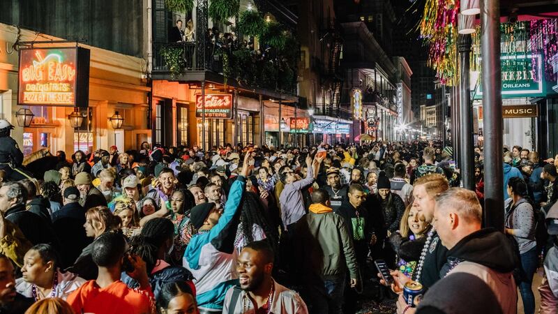 Mardi Gras revellers on Bourbon Street in New Orleans on February 22nd. Photographer: William Widmer via New York Times