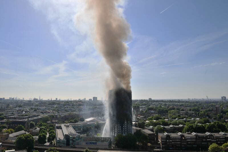 Smoke billows from the 24-storey Grenfell Tower in west London following a fire that claimed 72 lives