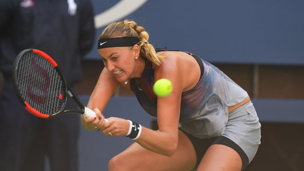 Petra Kvitova returns the ball during her match against France’s Caroline Garcia. Photograph: AFP /Timothy A Clary