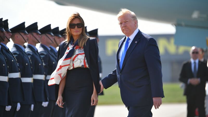 US president Donald Trump and US first lady Melania Trump walk on the tarmac after disembarking Air Force One at Stansted Airport on Monday. Photograph: Getty Images