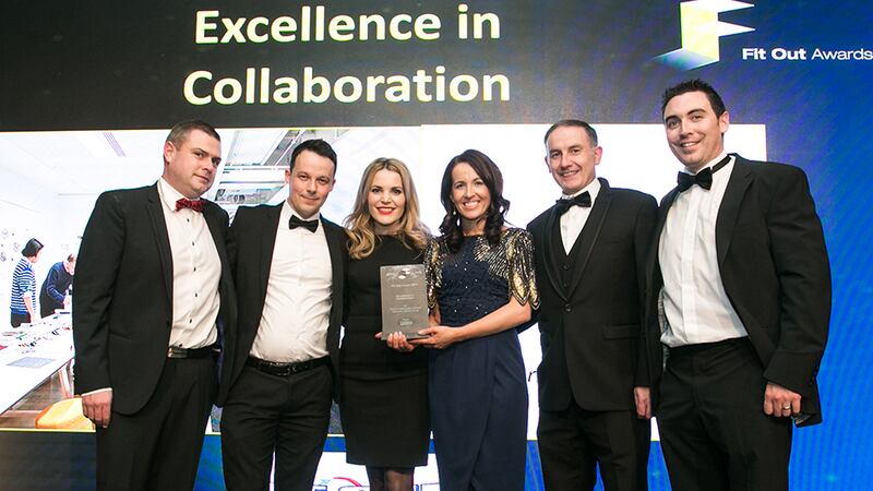 Paul Byrne, Sales Director, Tech Refrigeration & Air Conditioning, presents the Excellence in Collaboration award to the Specialist Joinery Group team