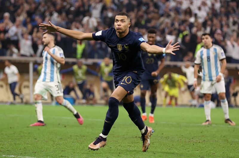 France's Kylian Mbappé celebrates scoring his side's third goal to complete his hat-trick in the World cup Final against Argentina at Lusail Stadium. Photograph: Martin Rickett/PA Wire