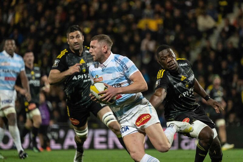 Racing 92's Scottish fly-half Finn Russell runs with the ball during the French Top14 rugby union match between Stade Rochelais (La Rochelle) and Racing 92. Photograph: Xavier Leoty/AFP via Getty