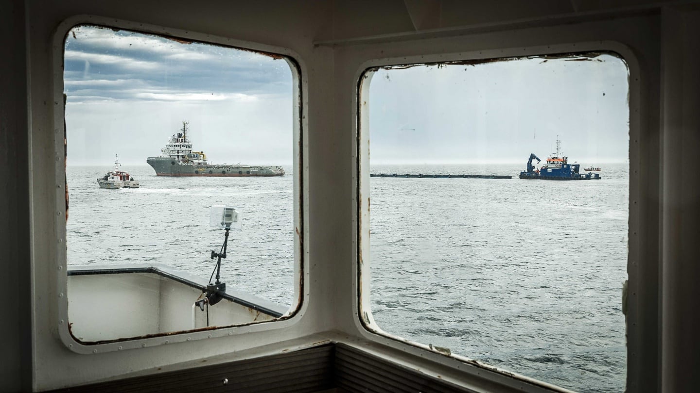 The first prototype of ‘The Ocean Cleanup’ is installed off the Dutch coast near Scheveningen, The Netherlands. Dutch Dredging and Marine experts company ‘Royal Boskalis Westminster’ together with the Dutch government contributeed €1.5 million to the project by Dutch inventor Boyan Slat. Photograph: EPA/REMKO DE WAAL