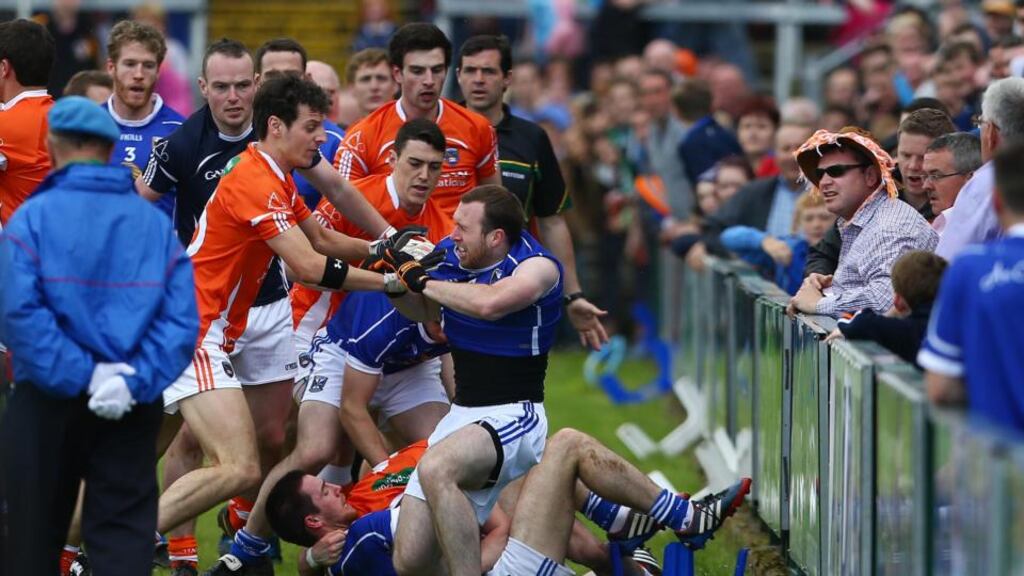 Armagh and Cavan players become involved in a row before the Ulster championship clash at the Athletic Grounds. Photo: William Cherry/Presseye/Inpho