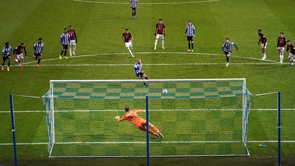 Sheffield Wednesday’s Barry Bannan scores from the penalty spot during the Championship match against Bournemouth at Hillsborough. Photograph: Zac Goodwin/PA Wire