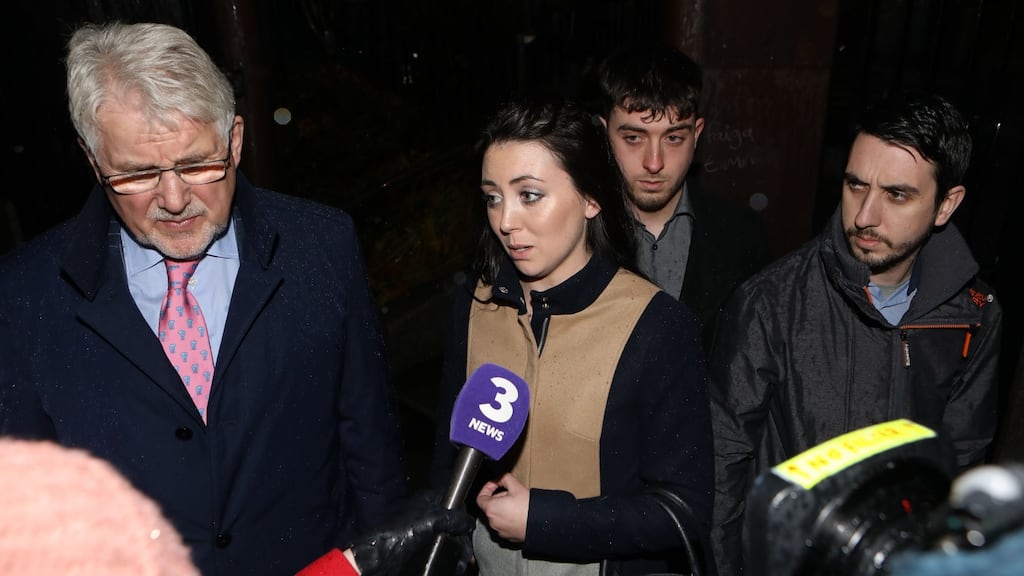 Carla Surlis (centre), daughter of Bernadette Surlis, speaking to the media after a High Court action on behalf of her mother was settled on Wednesday. Also pictured are solicitor Damien Tansey (left), Enda Surlis and Damien Surlis. Photograph: Collins Courts