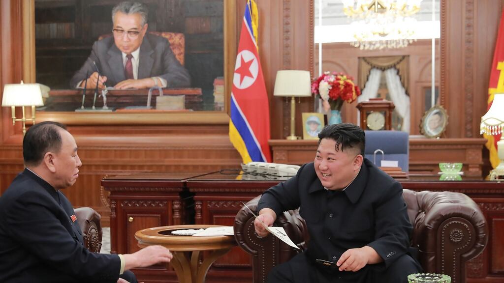 Kim Jong-un talking with Kim Yong-chol, vice-chairman of the WPK Central Committee and delegation leader of the second US-North Korea high-level talks to be held in Washington. Photograph: KCNA VIA KNS/AFP