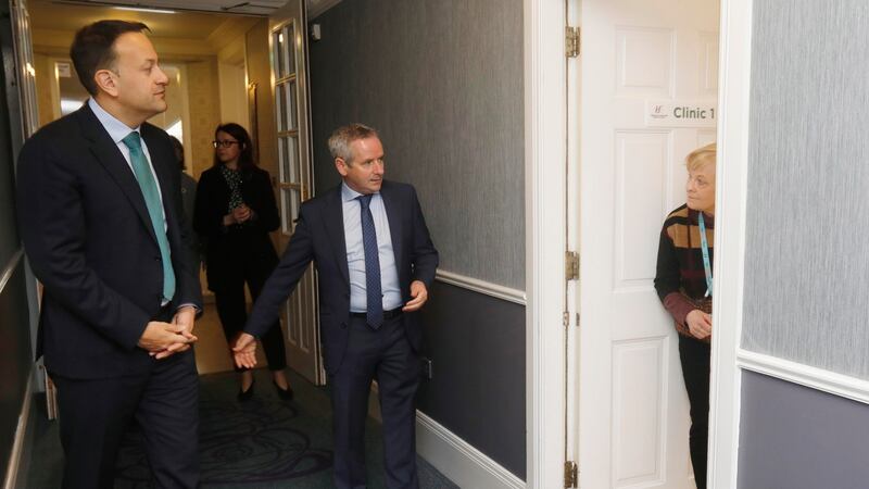 Taoiseach Leo Varadkar and Paul Reid CEO of the HSE entre one of the Clinic rooms in the Citywest Hotel which will have the use of the 750-bedroom for self isolation. Photograph: Leon Farrell/Photocall Ireland