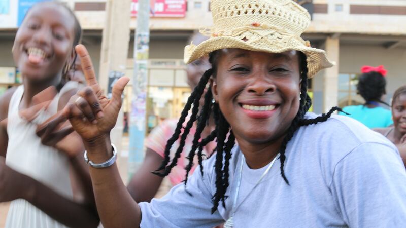 Locals in the village of Faji Kunda, near Banjul, celebrate the victory of Adama Barrow . Photograph: Lorraine Mallinder