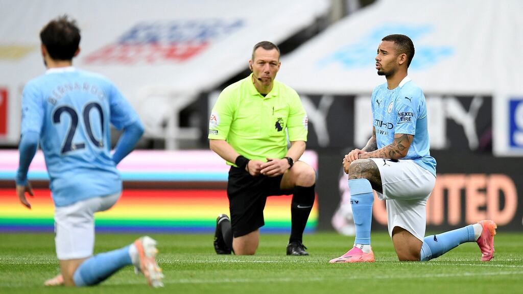 Manchester City players take the knee. Photo: Peter Powell/POOL/AFP via Getty Images