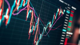 Shares decline as central bankers signal interest rate rises