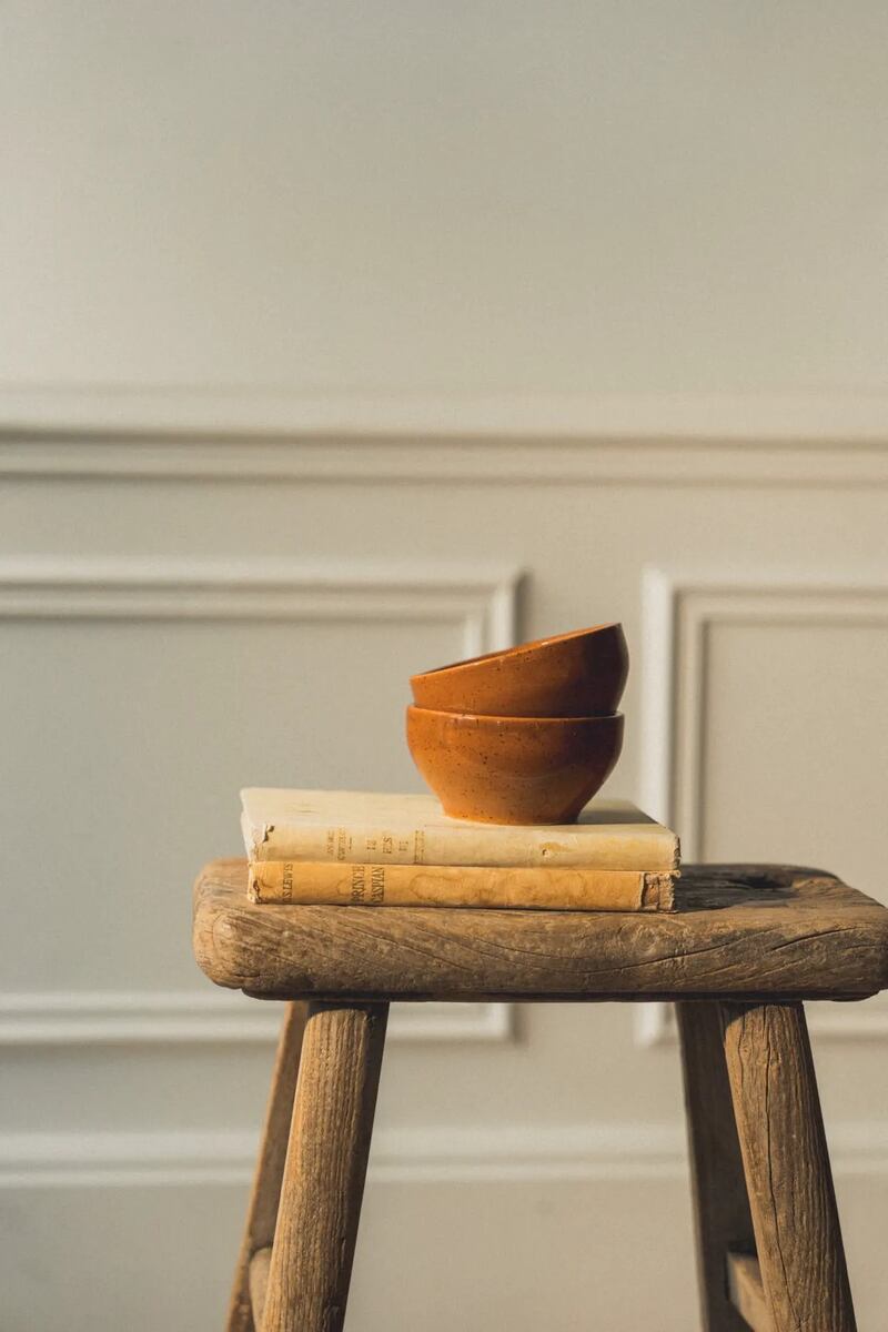 Used as vases and tealight holders, recycled jars and bowls create a ‘wilder’ aesthetic, which sits really well in an outdoor room, Emma Delaney suggests