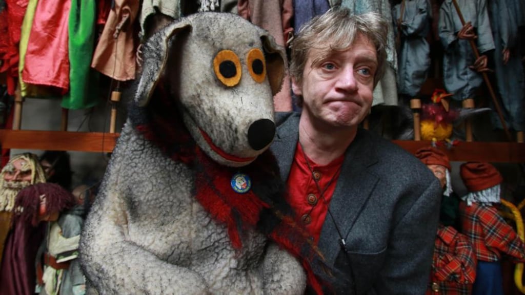 Liam Lambert in the fire-damaged area of the Lambert Puppet Theatre with Judge of ‘Wanderley Wagon’. Photograph: Nick Bradshaw