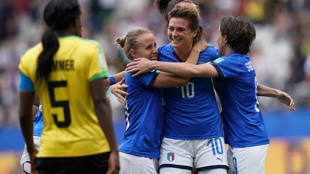 Italy striker Cristiana Girelli is congratulated by team-mates after completing her hat-trick in the Women’s World Cup game against Jamaica at the Auguste-Delaune Stadium in Reims. Photograph: Lionel Bonaventure/AFP/Getty Images