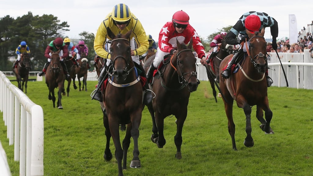 Westerner Lady ridden Ruby Walsh (left) wins The Ladbrokes Handicap Hurdle during day six of the Galway Festival in Ballybrit. Photograph: Niall Carson/PA Wire