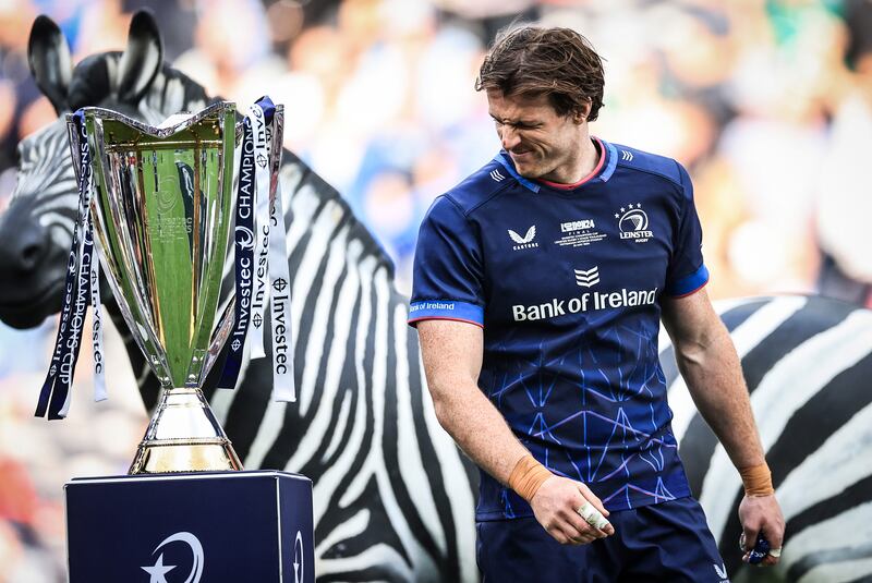 Leinster’s Ryan Baird dejected as he walks past the cup. Photograph: Billy Stickland/Inpho