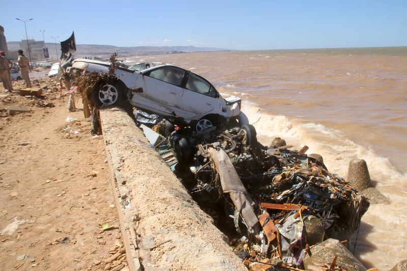 Destruction wrought by the storm that swelled up the river and swept away two ageing dams in Derna's hills. Photograph: Yousef Murad/AP