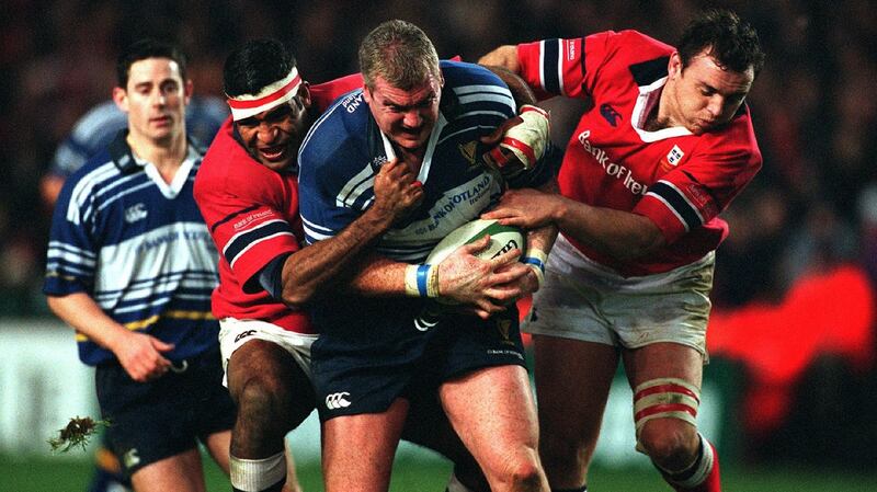 Leinster’s Victor Costello is  tackled by Munster’s Jim Williams and Rob Henderson. Photograph: Billy Stickland/Inpho